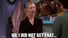 a woman is standing in front of a man and says oh i did not get that ...