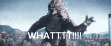 a monster is standing in front of a city with the words whatttt !!!