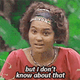 a woman wearing a headband and a red shirt says but i do n't know about that .