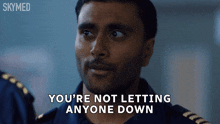 a man says " you 're not letting anyone down " in front of a skymed logo