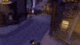 a video game character is standing on a sidewalk in front of a building in a city .