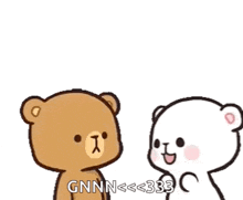 two teddy bears are standing next to each other and talking .