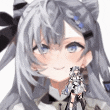 a close up of a girl 's face with gray hair and blue eyes