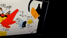 a computer screen shows a drawing of a spongebob character with the word cat on it