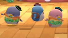 three cartoon penguins are dancing on a wooden floor .
