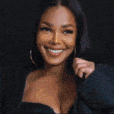 a woman is smiling with a green check mark in front of her face