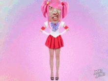 a cartoon of a girl with pink hair and a man 's face on her head