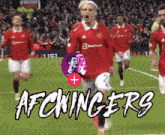 a soccer player with the number 2 on his jersey celebrates