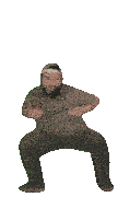 a man with a beard is dancing with his hands in his pockets