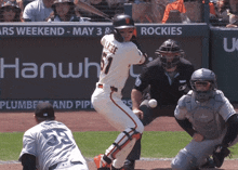 a baseball player with the number 1 on the back of his shirt