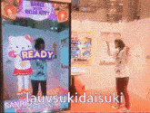 a person holding a sign that says ready