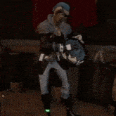 a man in a video game is holding a drum