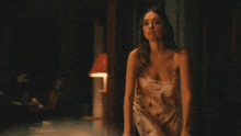 a woman says " protect me " in a dark room