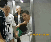 a man wearing a shirt with the number 17 on it