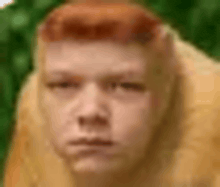 a close up of a person 's face with a monkey 's head .