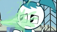 a close up of a cartoon character with a green light coming out of his eyes .