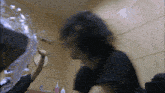 a blurry picture of a person brushing their teeth with a toothbrush