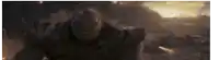 a close up of thanos from avengers : age of ultron standing in the desert .