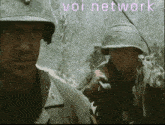 two soldiers are standing next to each other with the words voi network written on the bottom
