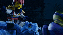 a lego girl with pink hair and headphones on