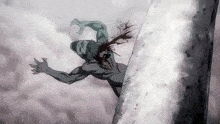 a man is falling off a cliff with blood coming out of his chest .