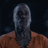 a man with his mouth open and water coming out of his nose and mouth