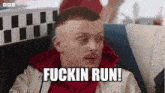 a man is sitting in a diner and says fuckin run