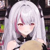 a girl with long white hair and red eyes has a picture of riya on the wall behind her