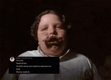 a picture of a person with chocolate on their face and a text box that says " mak 's "