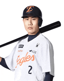 a baseball player with the number 2 on his shirt