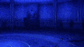 a close up of a person 's mouth with a blue light behind it .
