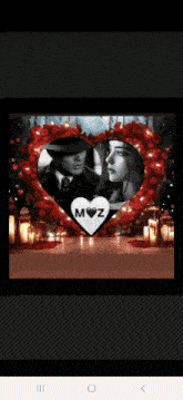 a picture of a man and a woman in a heart with the letters m and z