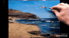 a person is painting a beach scene with the words made in animotica at the bottom