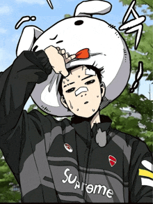 a man wearing a supreme jacket has a white bunny hat on his head