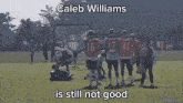 caleb williams is still not good with a group of football players walking on a field
