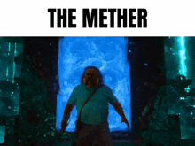 a man in a green shirt is standing in front of a blue portal with the words the mether above him