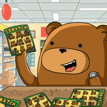 a bear is holding up a scratch card