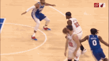 a basketball player with the number 22 on his jersey is dribbling the ball