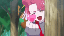a girl with pink hair is holding a heart in her hand