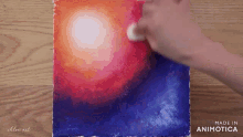 a painting of a red and blue galaxy is made in animatica