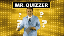 a man in a suit and tie is holding a microphone in front of a sign that says mr. quizzer