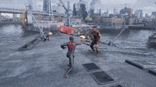 a man in a spiderman suit is fighting another man