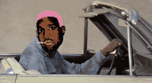 a man smoking a cigarette in a car with a pink head