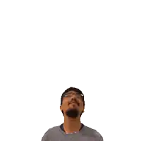 a man with glasses and a cross on his head