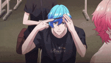 a boy with blue hair is wearing a black shirt that says b project