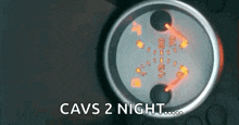 a close up of a gauge with the words `` cavs 2 night '' written below it .