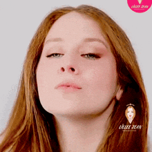 a close up of a woman 's face with the word lillee jean on the bottom