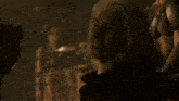 a man with white hair is standing in a dark room