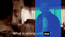 a man is standing in front of a box with the words what is wrong with me written on it .