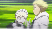 a man and a maid are standing next to each other and the maid is pointing at the man